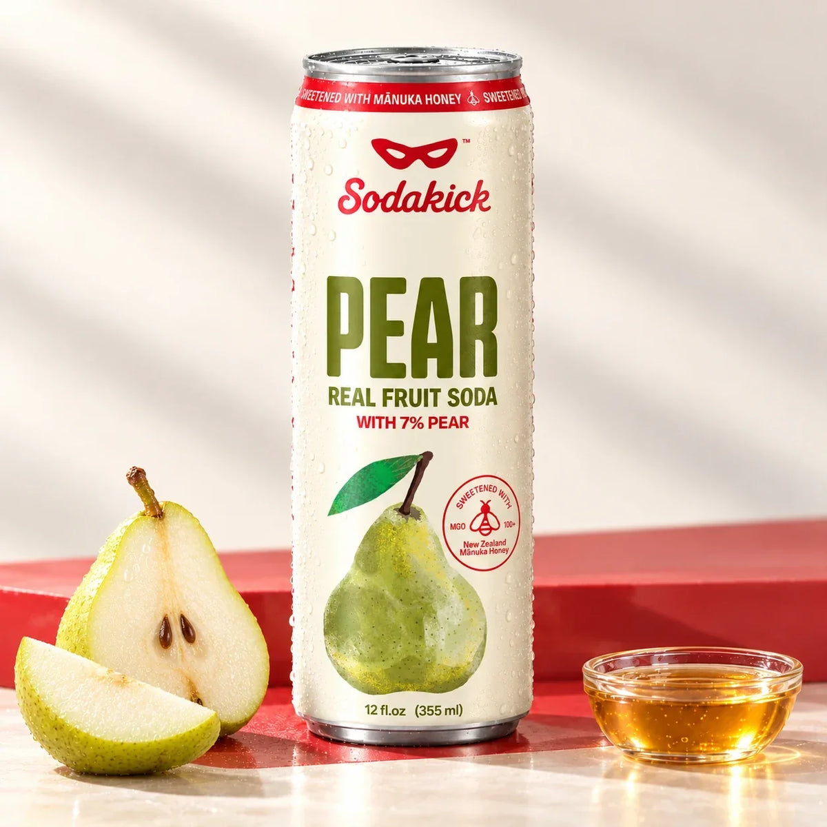 Sodakick Pear honey soda can with pears and a bowl of honey