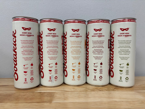 The story side of the five sample cans, which reads Every hero needs a Sodakick