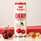 Sodakick Cherry can with fresh cherries and a small bowl of honey