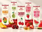Sodakick cans in Mango, Pear, Cherry, Strawberry and Watermelon with fresh fruit and a bowl of honey